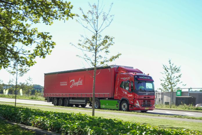 Electric Danfoss truck on the road
