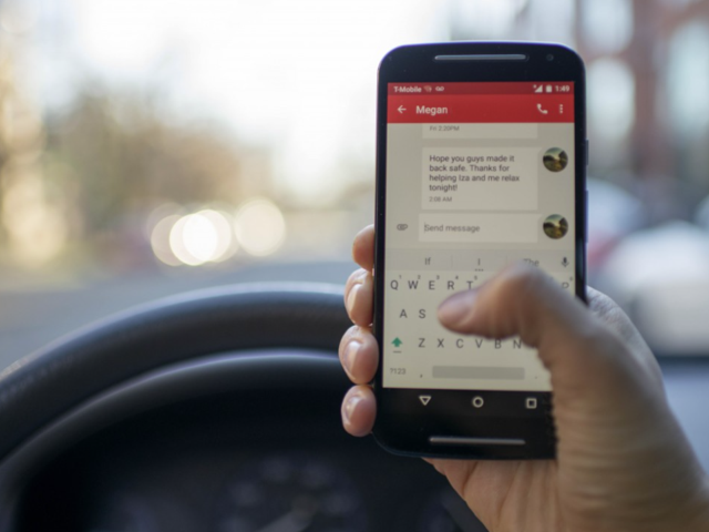 S3 phone_at_wheel-960x720