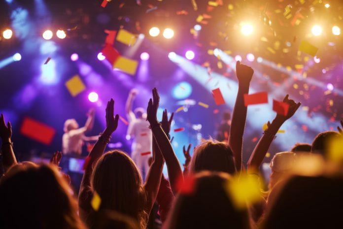 Energetic,Concert,And,Music,Festival,With,Cheering,Crowd,,Dazzling,Stage